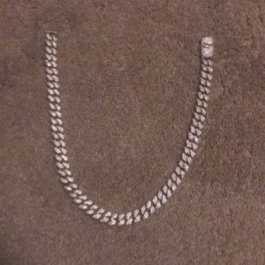 Iced out 12mm Cuban link chocker.